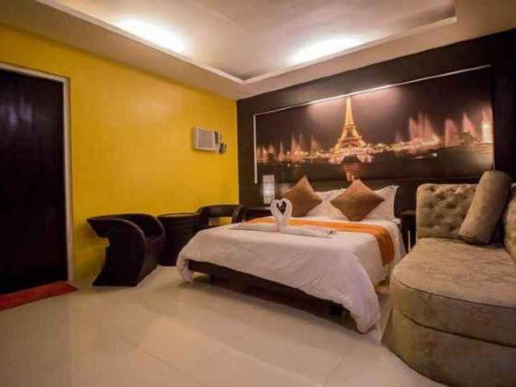 The Red Palm Suites And Restaurant Butuan City Exterior foto