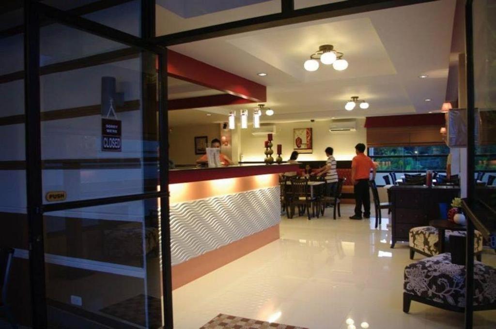 The Red Palm Suites And Restaurant Butuan City Exterior foto