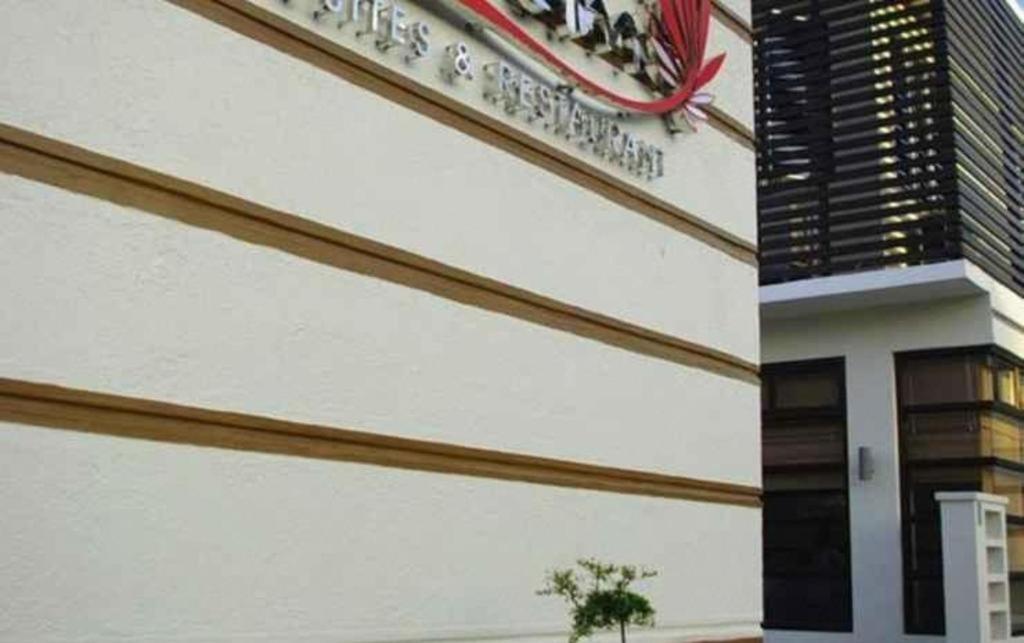 The Red Palm Suites And Restaurant Butuan City Exterior foto