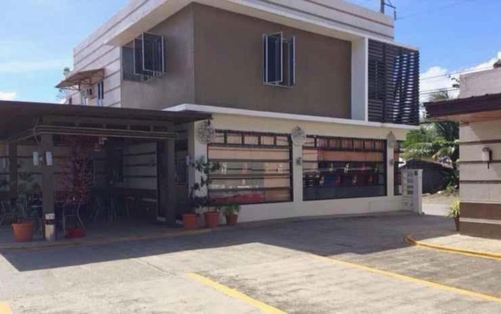The Red Palm Suites And Restaurant Butuan City Exterior foto